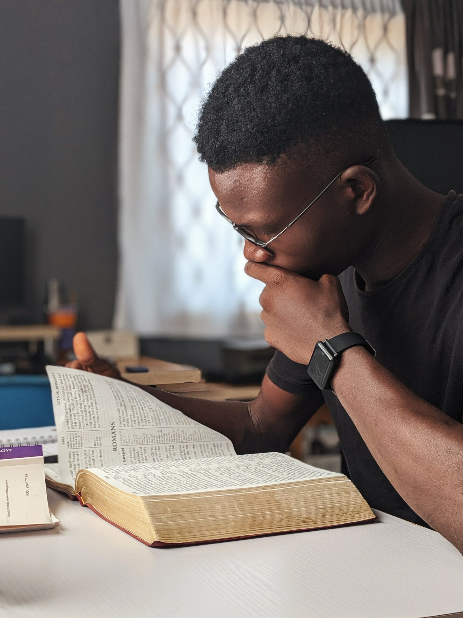 Man reading bible